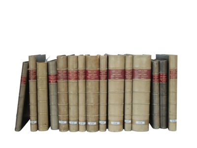 many books that are lined up together on a shelf