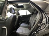a car that has the door open and the seats down
