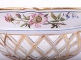 a bowl with a floral design on it on a table