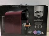 the box of the coffee maker is open and ready to be used