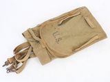 a small bag with a handle on it on a white surface