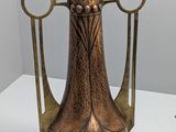 two vases that are sitting on a table