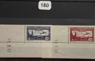 two stamps are on a piece of paper with numbers on them