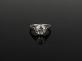 a diamond single - stone ring,