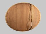 a wooden plate with a rope around it