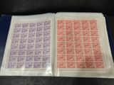 a close up of a book with stamps on it on a table