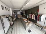 a room that has a lot of clothes on display