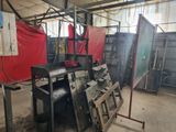 a picture of a factory with a lot of metal items