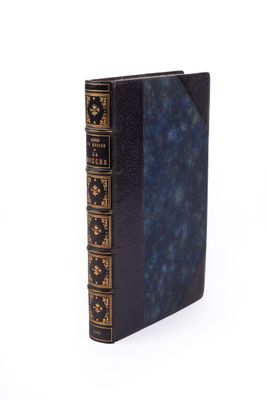 an image of a black book with gold trims