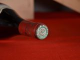 a bottle of wine that is sitting on a table