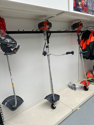 a lot of tools that are hanging on the wall