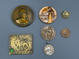 a lot of coins that are on a table