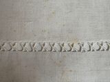 a close up of a piece of cloth with stitching on it