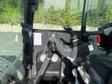 a close up of the steering wheel of a tractor