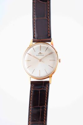 an image of a close up of a wrist watch on a white background