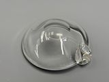 a clear glass bowl with a clear lid on a table