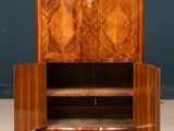 an image of a very nice looking cabinet with a door open