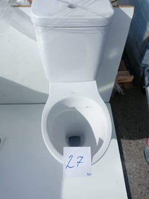 a white toilet with a sign on it that says it is not a toilet