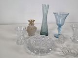 a lot of glass items sitting on a table