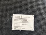 an image of a luggage tag on a black suitcase