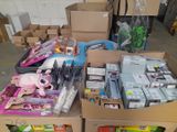 many boxes of toys and other items sitting on the floor