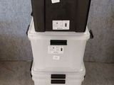 three stackable plastic storage containers stacked on top of each other