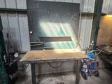 an image of a workbench with a chalkboard on it