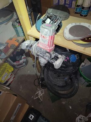 a picture of a room with a lot of stuff on the floor