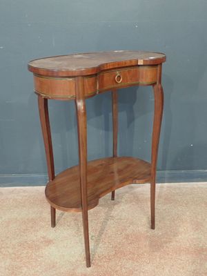 a small wooden table with a drawer on top of it