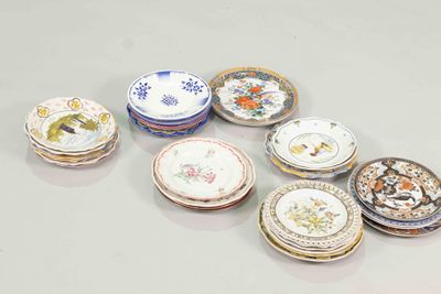 a lot of plates that are sitting on a table