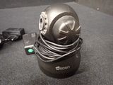 an image of a black object with wires wrapped around it