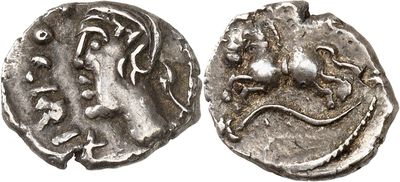 a silver coin with an image of a woman on it