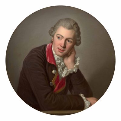 portrait d'un homme vêtu d'un manteau noir et d'une écharpe rouge