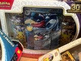 a box of pokemon toys sitting on a table