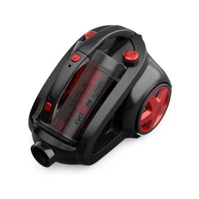 un gros plan d'un aspirateur noir et rouge posé sur une surface blanche