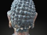 an image of a statue of a person with a head of hair
