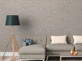 a couch and a lamp in a room with wood flooring