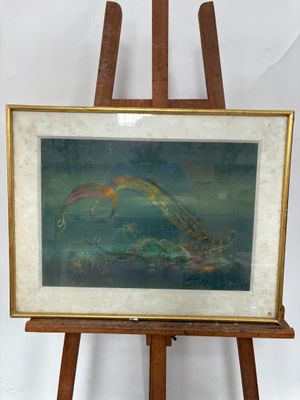 tableau posé sur un chevalet représentant un poisson dans l'eau