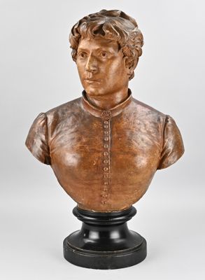 a close up of a bust of a man on a pedestal