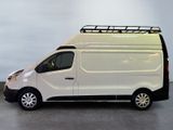 a white van with a roof rack on top of it