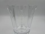 a glass vase that is sitting on a table