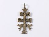 an image of a cross with angels on it on a white surface