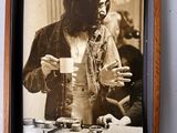 a picture of a woman holding a cup of coffee