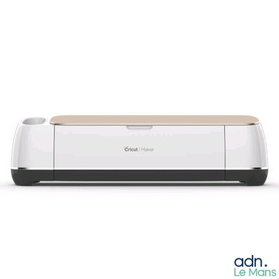a close up of a cricut maker on a white background