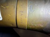 a close up of a metal pipe with a label on it