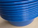 a large blue bowl sitting on top of a counter