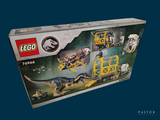 a box of legos with a picture of a t - rex