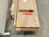 many boxes and boxes on the floor in a warehouse