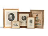 several framed and unframed portraits of men and women