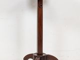 an image of a small table with a metal top on a wooden stand